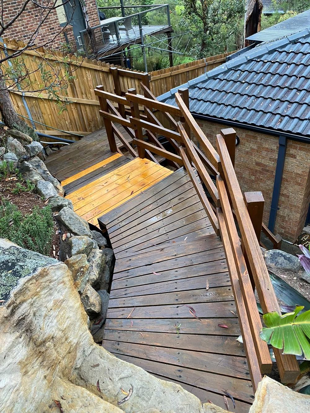 New treated pine stair treads fitted into the existing timber stairs, seen from above